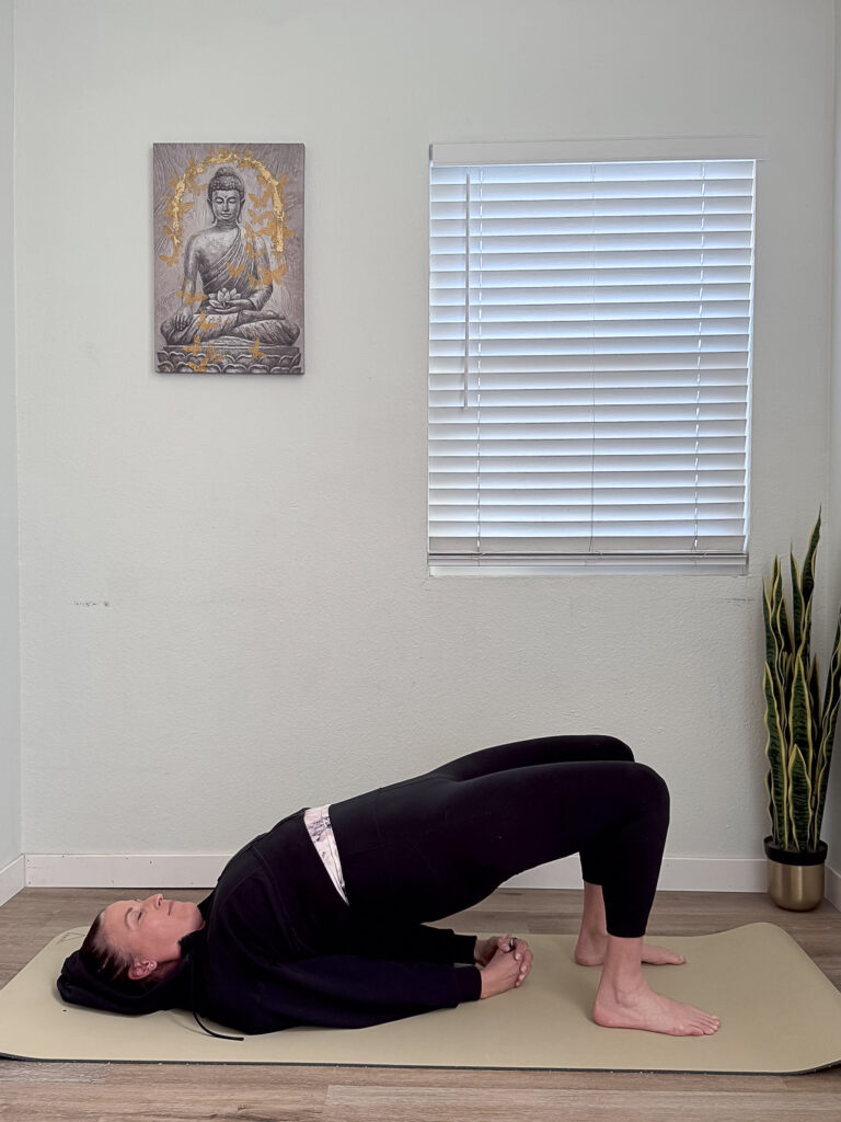 Pacific Yoga & Fitness, online yoga instructor, shares Yoga For Low Back Pain. half splits